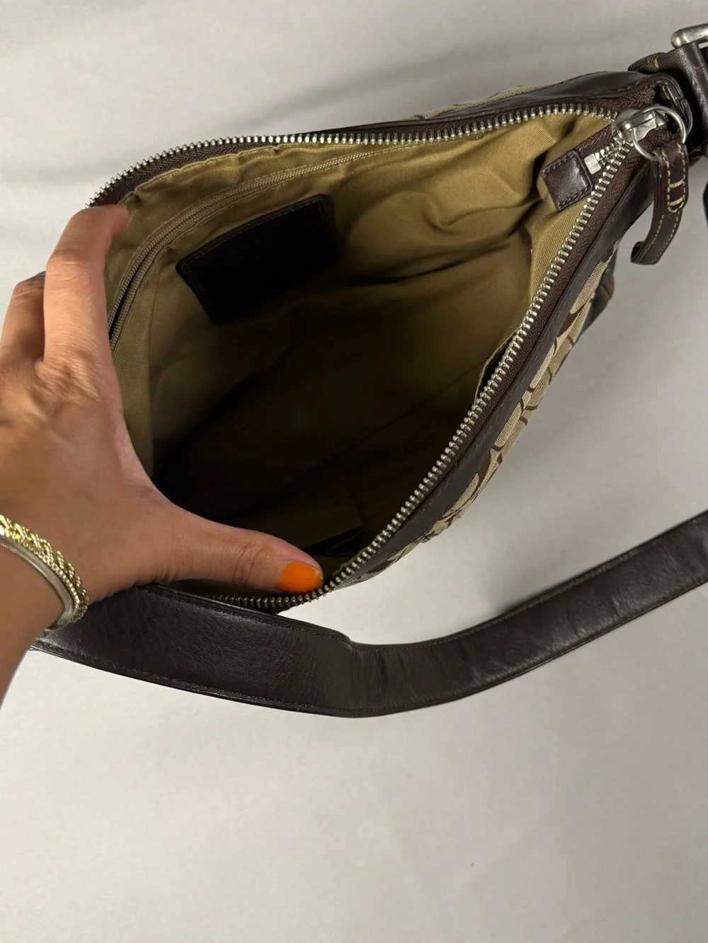 vintage Y2K-era signature canvas and leather hobo/shoulder bag